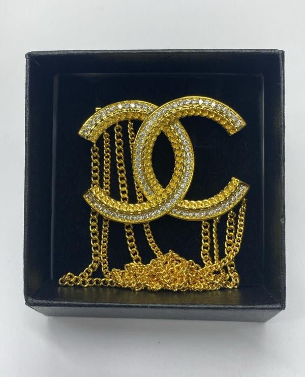 Prendedor Marca Chanel Diseño Cadenas Dorado
