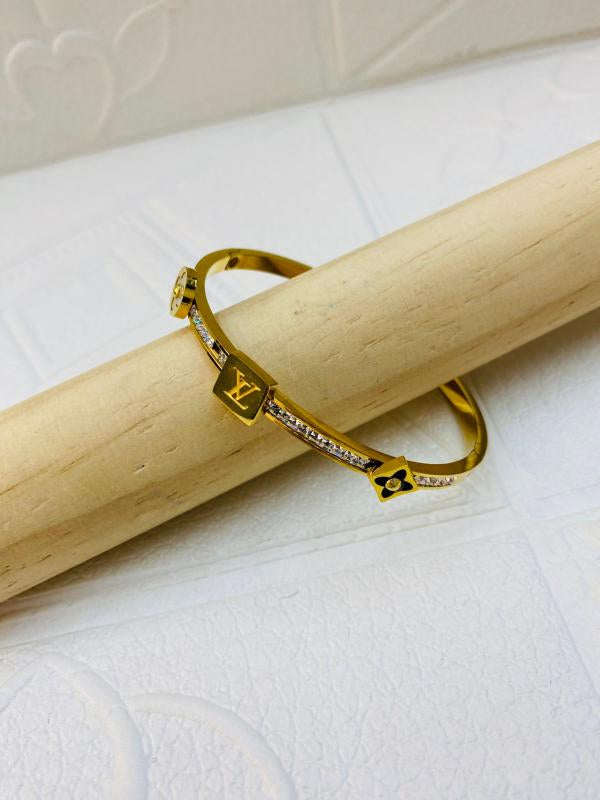 Pulsera De Acero Rigida Louis Vuitton Diseño Lv/Flor Dorado