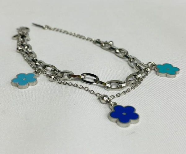 PULSERA DE ACERO DOBLE PLATEADA FLORES CELESTE