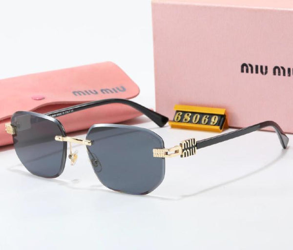 LENTES DE SOL MIU MIU 68069 NEGRO