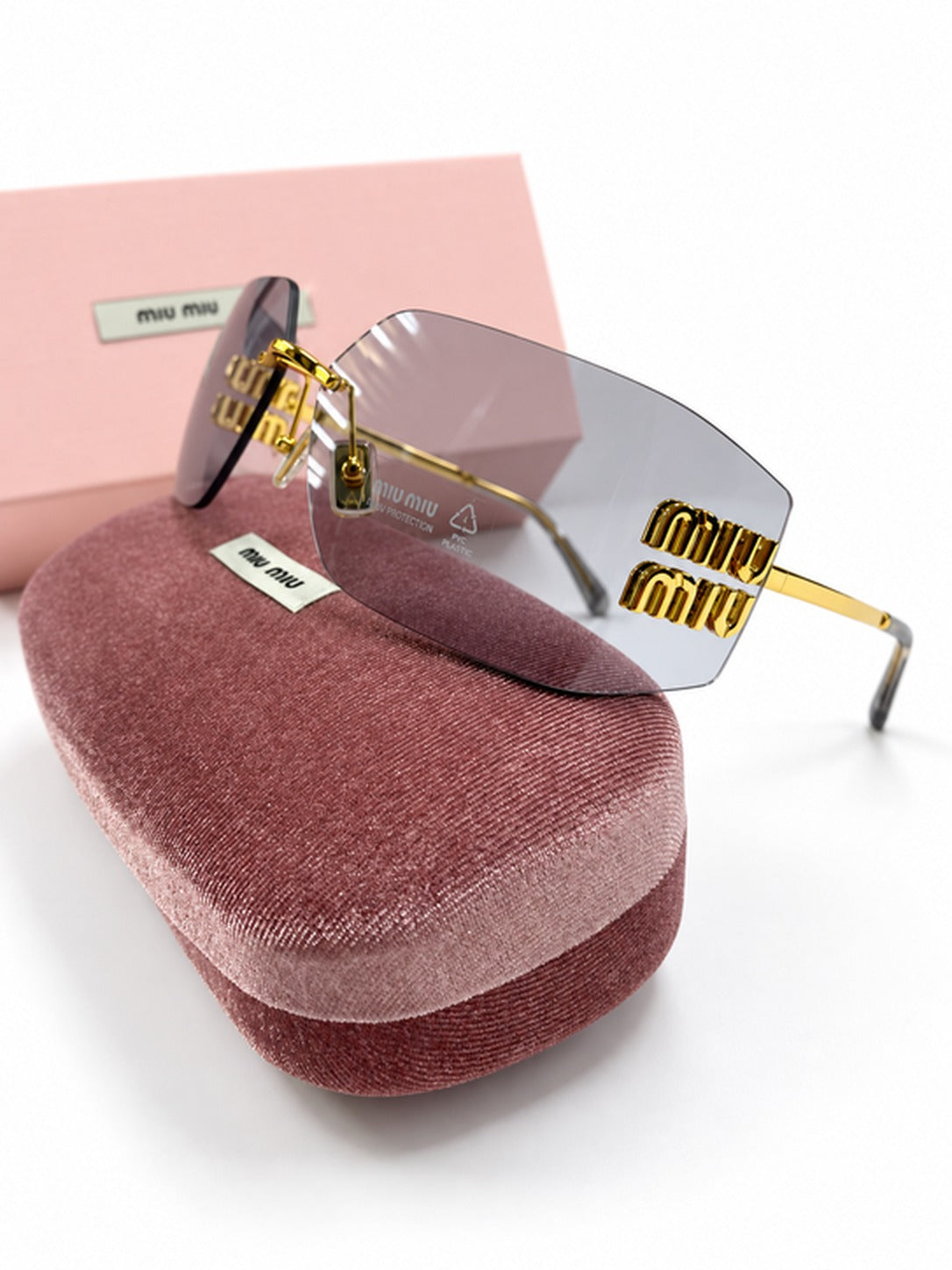 Lentes de Sol Miu Miu Runway Gris