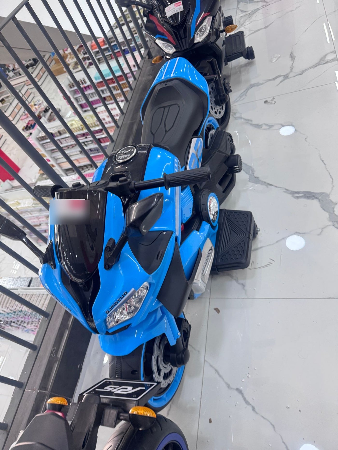 Moto eléctrica deportiva superbike azul para niños