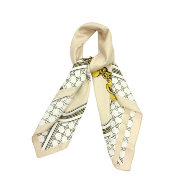 BANDANA 90x90 CON ESTAMPADO DE CADENAS CON BORLAS BEIGE