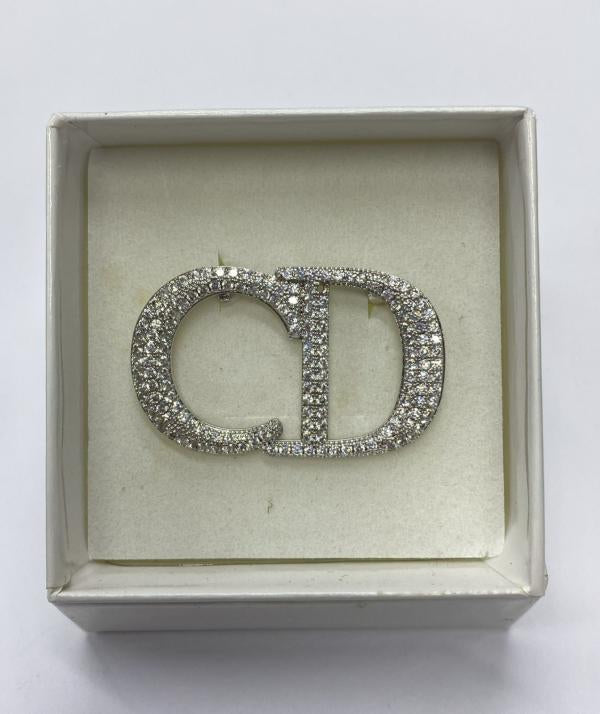 Prendedor  Marca Dior  Diseño Cd Plateado