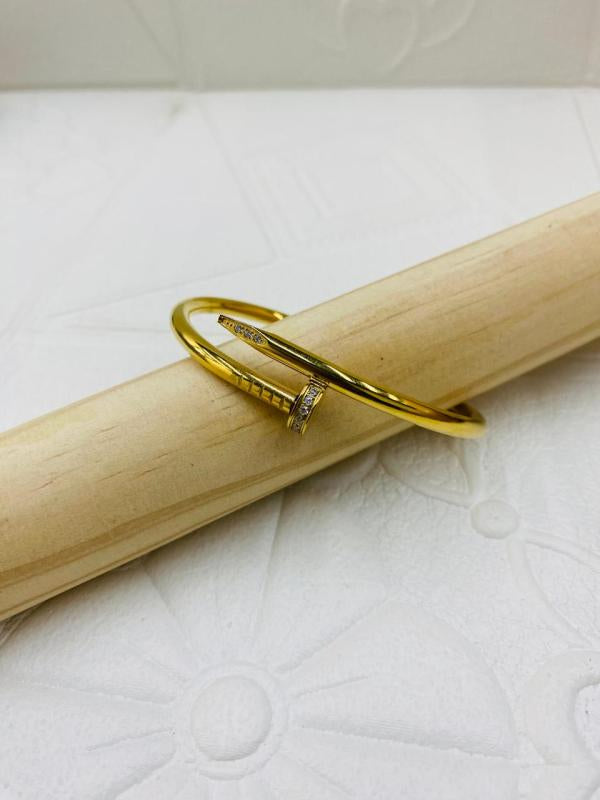 Pulsera De Acero Rigida Cartier Diseño Clavo Dorado