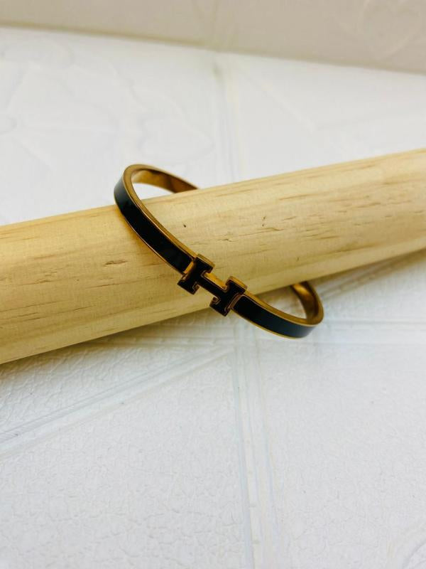 Pulsera De Acero Rigida Hermes Diseño H Negro Oro Rosa