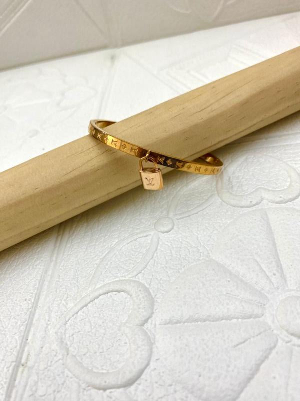 Pulsera De Acero Rigida Louis Vuitton Diseño Candado Oro Rosa