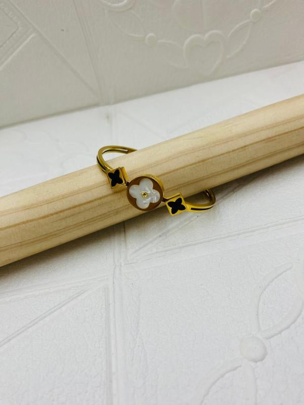 Pulsera De Acero Rigida Louis Vuitton Diseño Lv Flores B/N Dorado