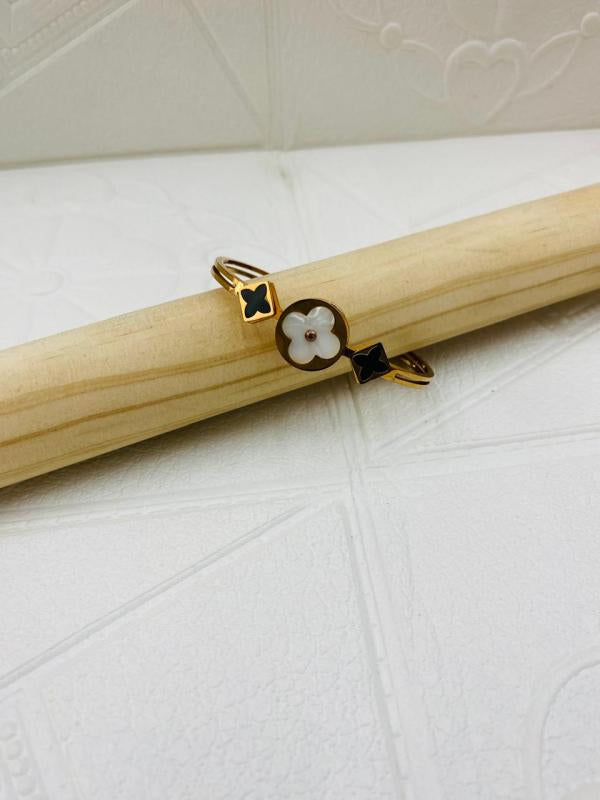 Pulsera De Acero Rigida Louis Vuitton Diseño Lv Flores B/N Oro Rosa