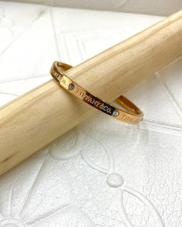 Pulsera De Acero Rigida Tiffany & Co Diseño Piedras Oro Rosa