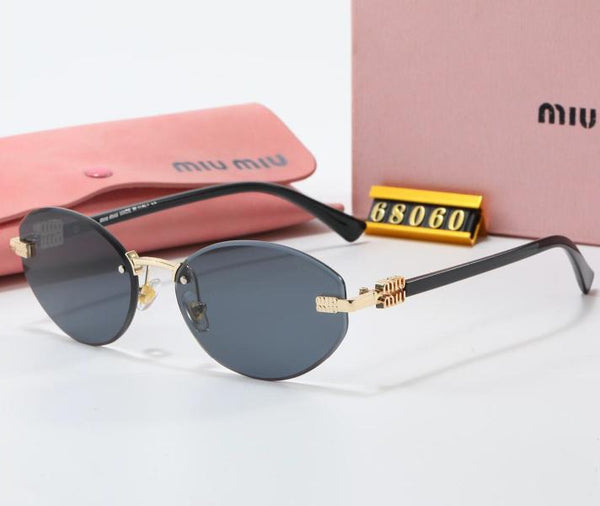 LENTES DE SOL MIU MIU 68060 NEGRO