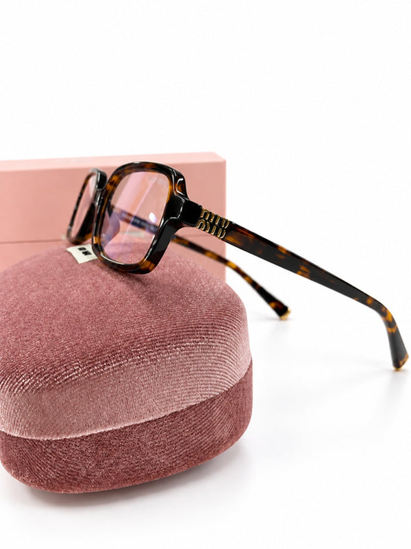 Lentes de Sol Miu Miu Rectangulares SMU11ZS-F Carey