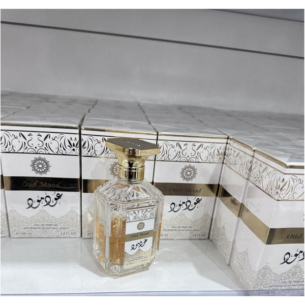 Perfume Oud Mood Unisex Eau de Parfum 100ml Frasco Ámbar con Tapa Dorada