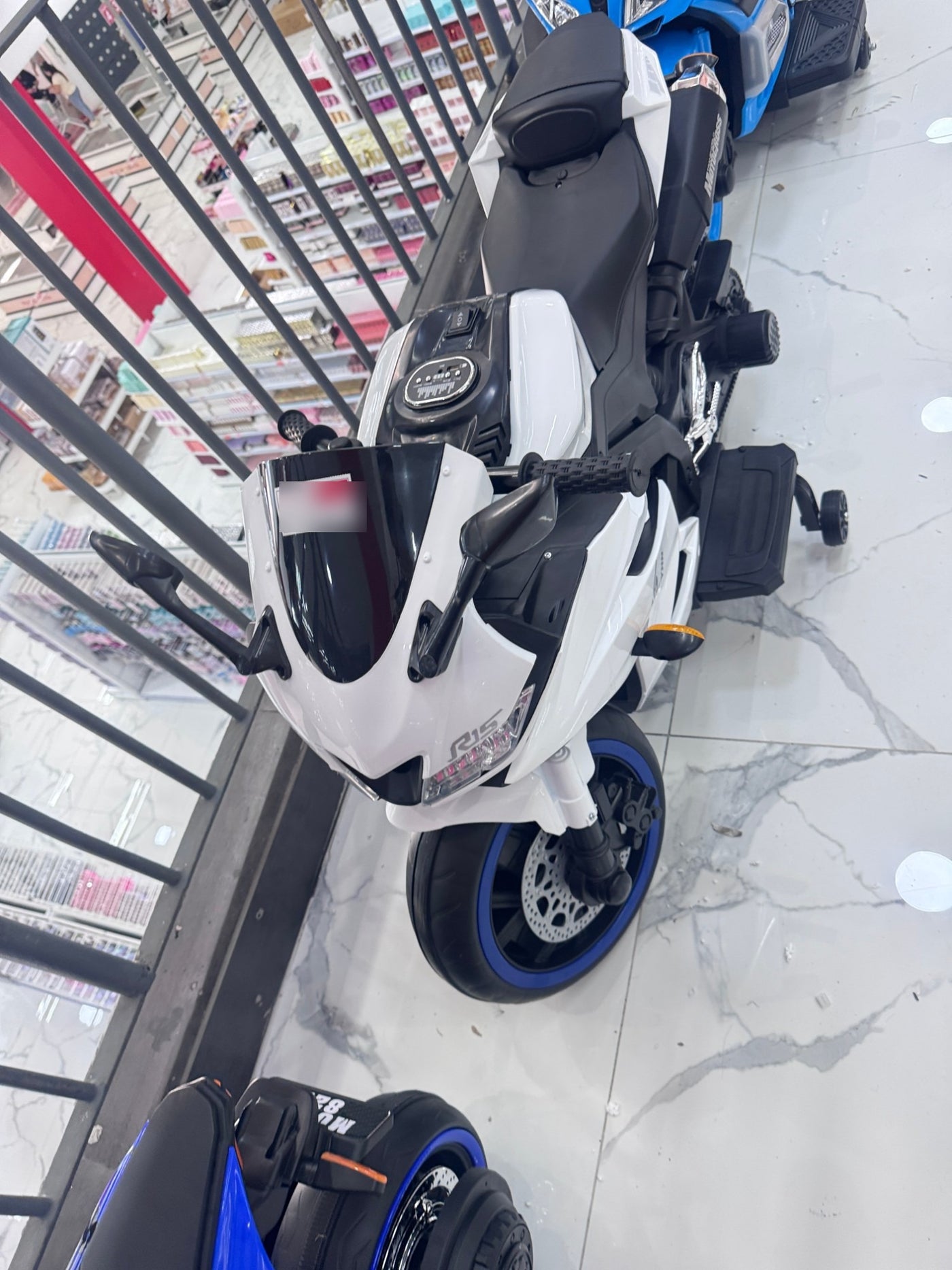 Moto eléctrica deportiva superbike blanca para niños