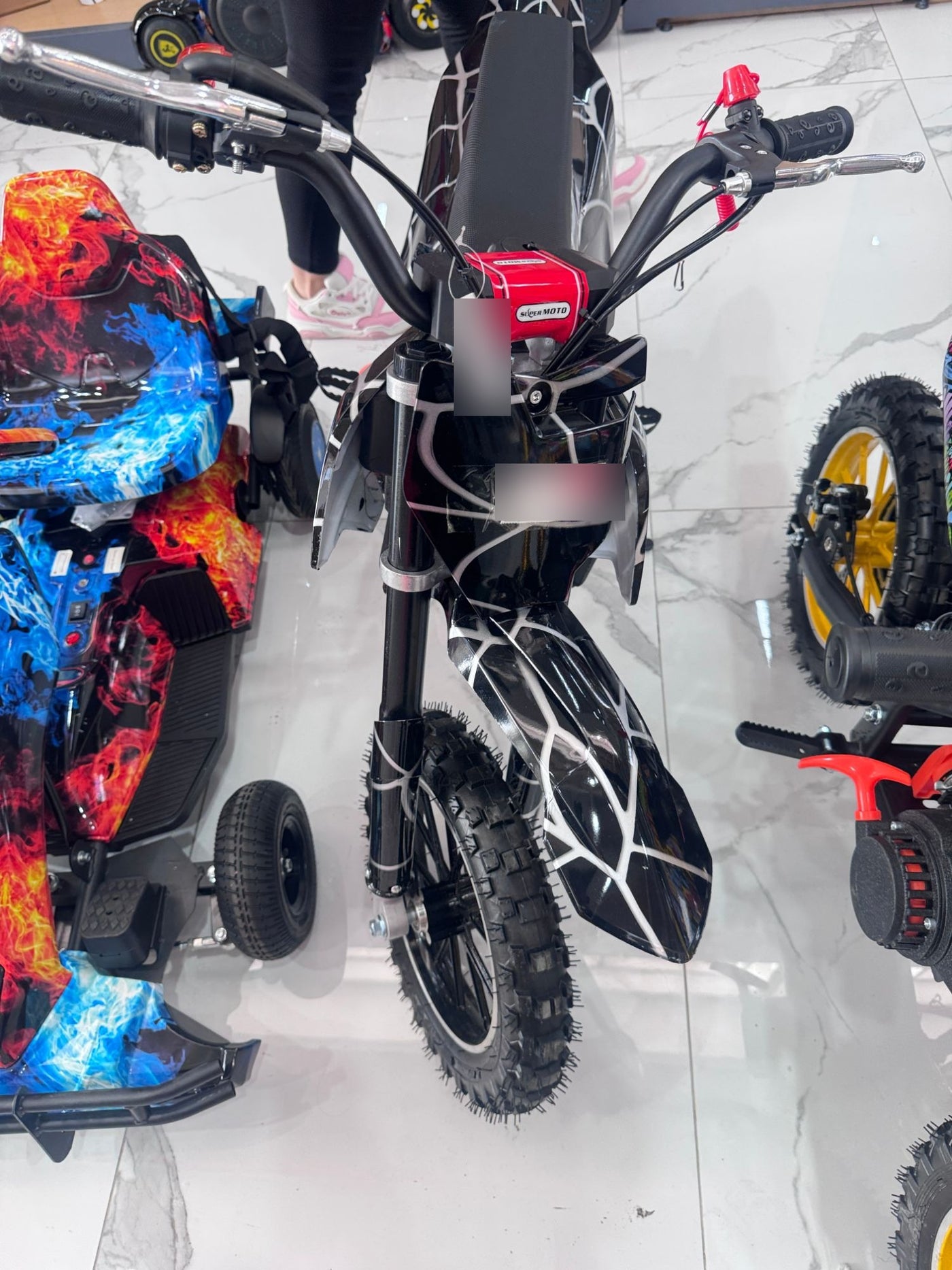 Mini moto a gasolina Super Moto diseño telaraña para niños