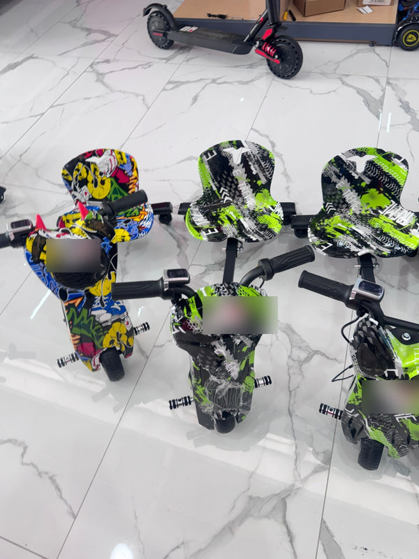 Triciclo eléctrico drift Extreme diseños graffiti y verde